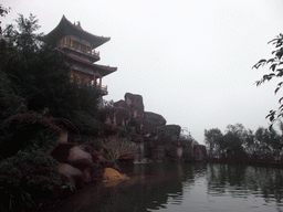 Drum tower and waterfall at the Yuchan Palace at the Hainan Wenbifeng Taoism Park