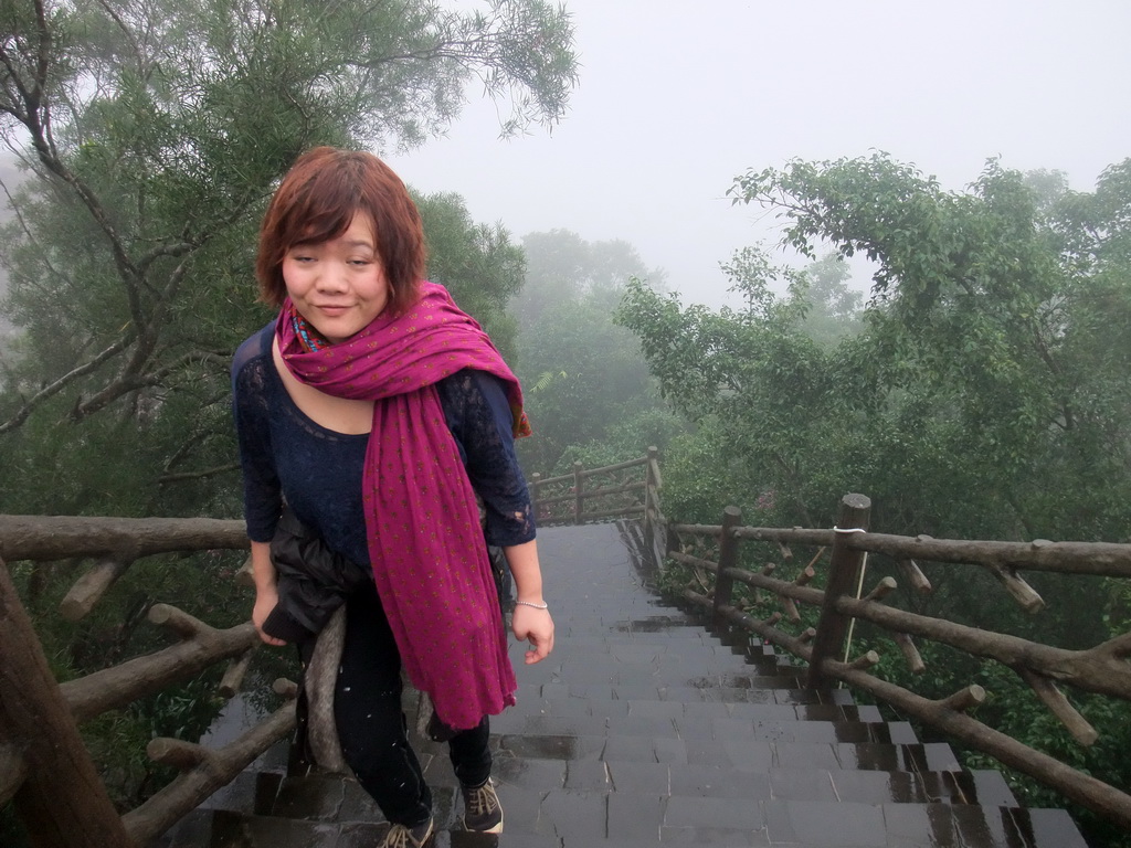 Miaomiao at the staircase to the upper platform of the Yuchan Palace at the Hainan Wenbifeng Taoism Park