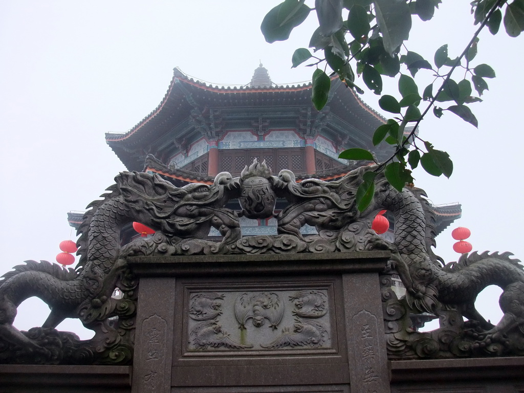 Dragon statues and the top of the pavilion at the Yuchan Palace at the Hainan Wenbifeng Taoism Park