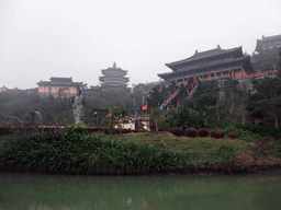 Pool, Buddha statue and the eastern staircase to the Yuchan Palace at the Hainan Wenbifeng Taoism Park