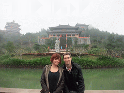 Tim and Miaomiao at the pool, Buddha statue and the eastern staircase to the Yuchan Palace at the Hainan Wenbifeng Taoism Park