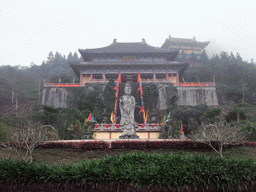 Buddha statue and the eastern staircase to the Yuchan Palace at the Hainan Wenbifeng Taoism Park