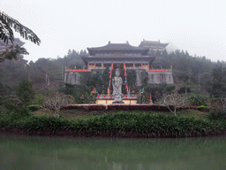 Pool, Buddha statue and the eastern staircase to the Yuchan Palace at the Hainan Wenbifeng Taoism Park