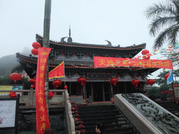 Temple, staircase and relief at the east side of the Hainan Wenbifeng Taoism Park