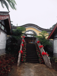 Staircase and round gate at the Nanjianzhou Ancient City at the Hainan Wenbifeng Taoism Park