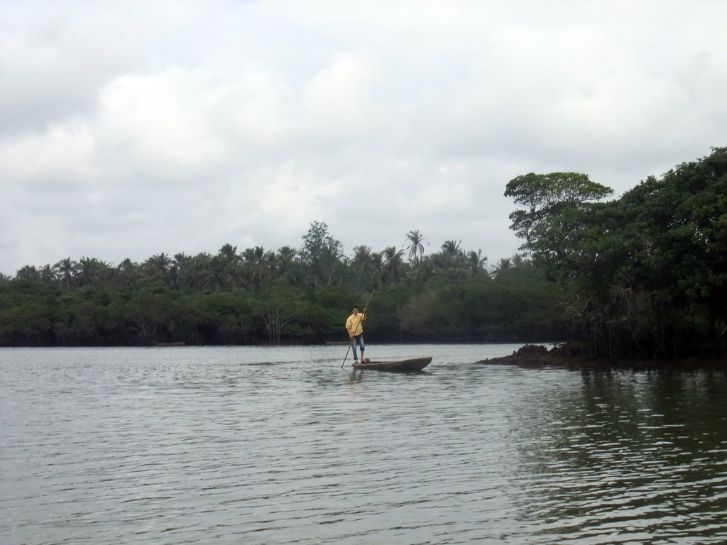 Fisherman on a boat at Bamenwan Bay, viewed from the tour boat