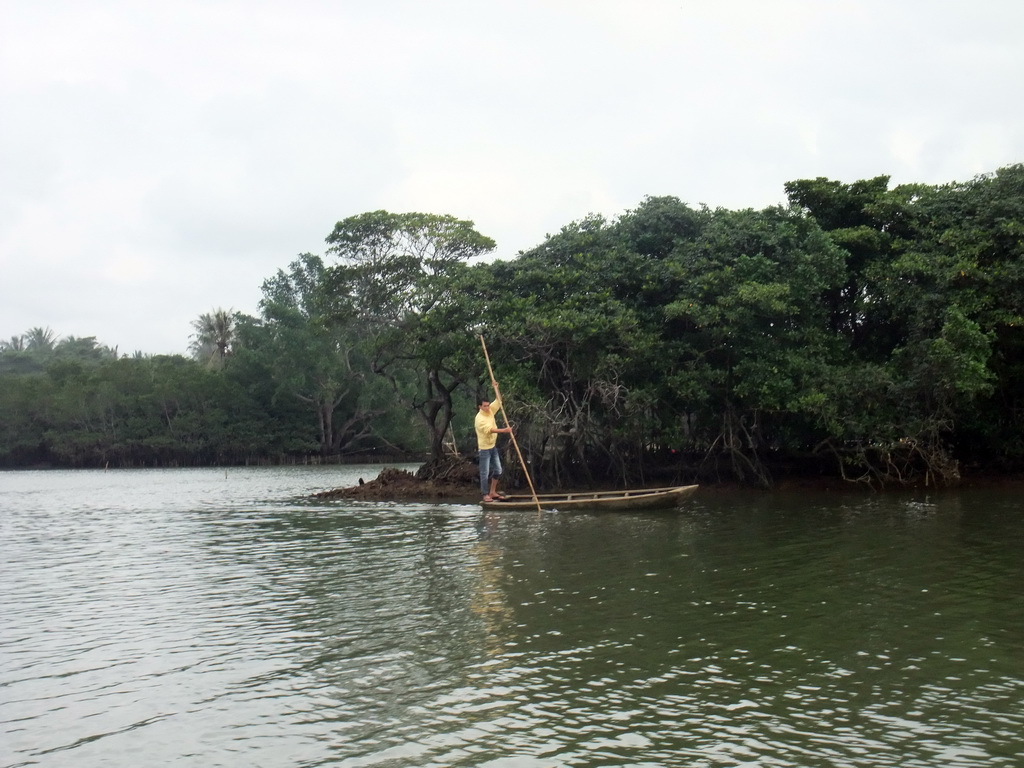 Fisherman on a boat at Bamenwan Bay, viewed from the tour boat