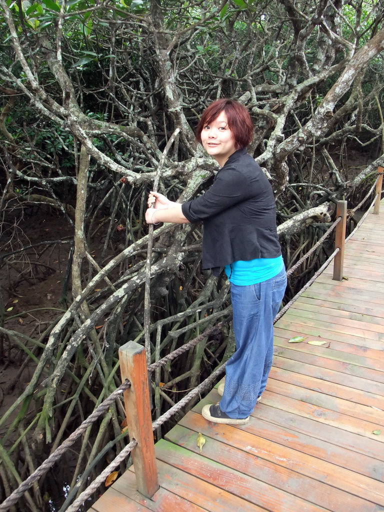 Miaomiao with a mangrove tree at the Bamenwan Mangrove Forest