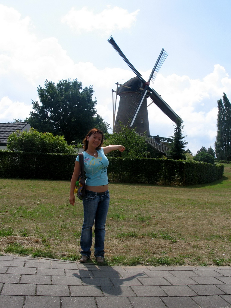 Miaomiao in front of the Wijchense Molen windmill at the Bronckhorstlaan street