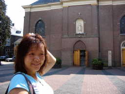Miaomiao in front of the St. Antonius Abt Church at the Oosterweg street