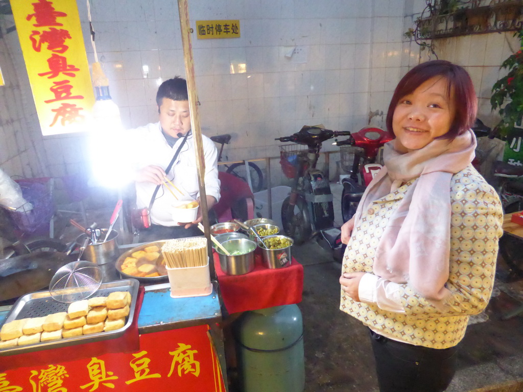 Miaomiao at a snack stall at the Taiwan Snack Street at Renhe Road