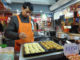 Snack stall with balls with filling at the Taiwan Snack Street at Renhe Road