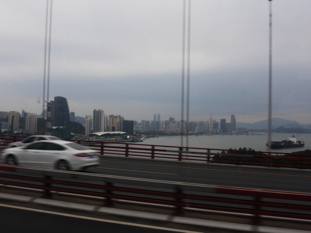 The west coast of Xiamen Island with the Xiamen International Cruise Center, the Bay Park and skyscrapers, and the Xiamen Bay, viewed from the bus to Yongding on the Haicang Bridge