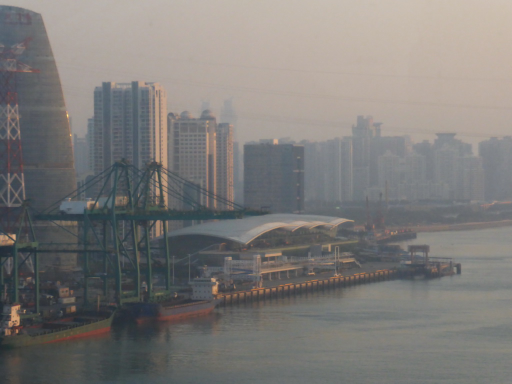 The Xiamen International Cruise Center, the Bay Park and skyscrapers at the west coast of Xiamen Island, viewed from the bus from Yongding on the Haicang Bridge