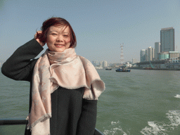 Miaomiao on the ferry to Gulangyu Island, with a view on Port nr. 1