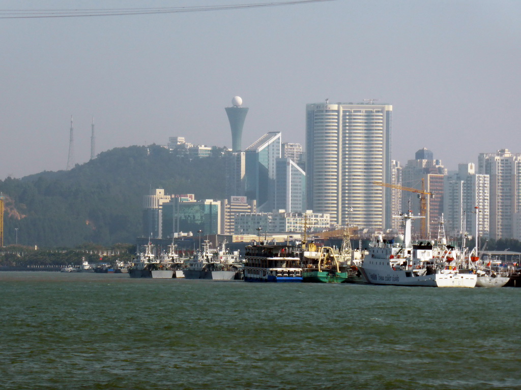 The Huweishan Atmosphere Theme Park with its tower and boats in Xiamen Bay, viewed from the ferry to Gulangyu Island