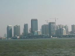 Skyscrapers at the southwest side of Xiamen Island, Xiamen BRT line nr. 1, Port nr. 1 and Xiamen Bay, viewed from the ferry to Gulangyu Island