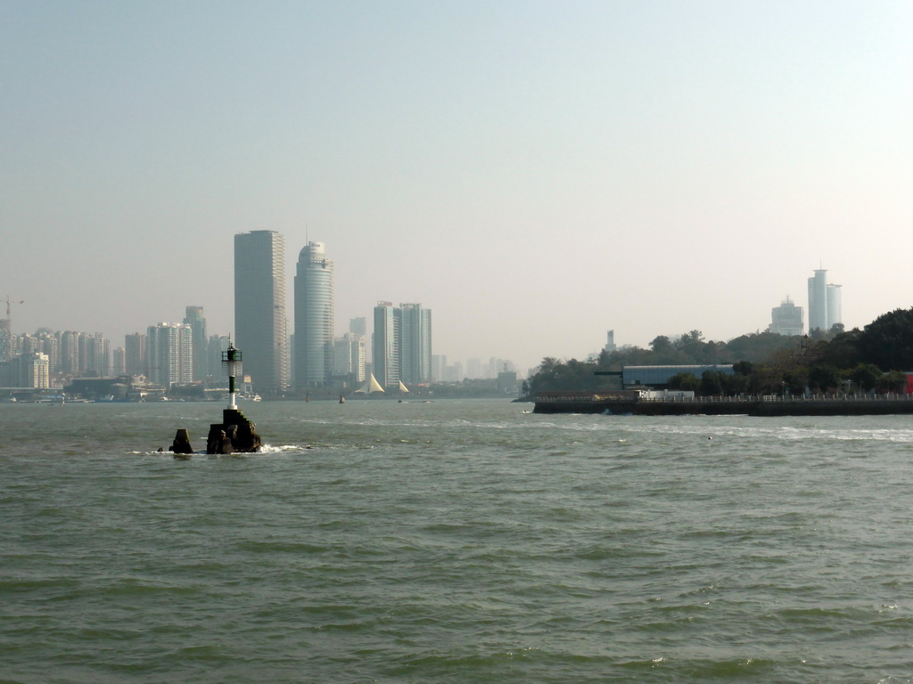 The north side of Gulangyu Island and skyscrapers at the southwest side of Xiamen Island, viewed from the ferry to Gulangyu Island