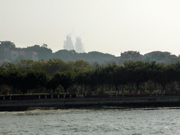 The west side of Gulangyu Island with two skyscrapers under construction at the southwest side of Xiamen Island, viewed from the ferry from Xiamen Island