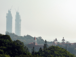 Buildings at the Qinyuan Garden at Gulangyu Island and two skyscrapers under construction at the southwest side of Xiamen Island, viewed from Jishan Road