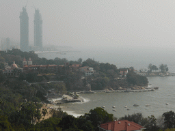 Gangzaihou Beach, the Shuzhuang Garden, the Forty-Four Bridge and the Piano Museum at Gulangyu Island, and two skyscrapers under construction at the southwest side of Xiamen Island, viewed from the garden of the house of Yin Chengzong at the Qinyuan Garden