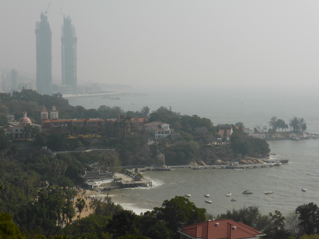 Gangzaihou Beach, the Shuzhuang Garden, the Forty-Four Bridge and the Piano Museum at Gulangyu Island, and two skyscrapers under construction at the southwest side of Xiamen Island, viewed from the garden of the house of Yin Chengzong at the Qinyuan Garden
