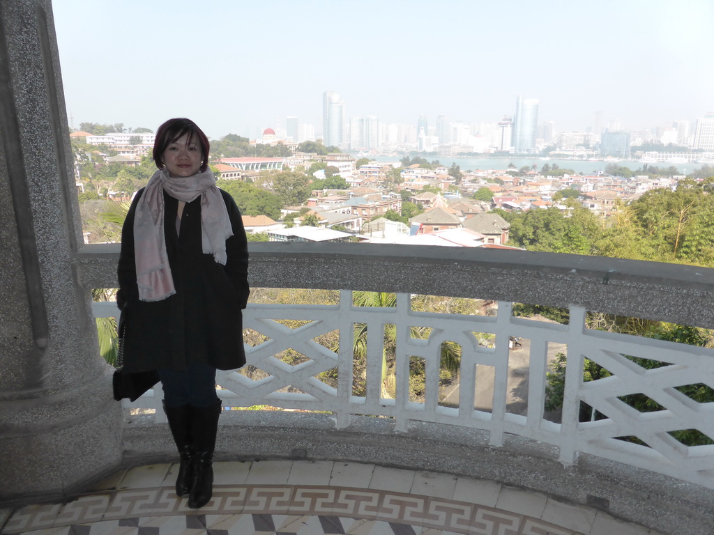 Miaomiao at the upper floor of the Zheng Chenggong Memorial Hall, with a view on the east side of Gulangyu Island and skyscrapers at the south west side of Xiamen Island