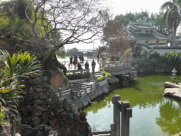 Miaomiao sitting in front of the Twelve Grotto Heaven at Gulangyu Island