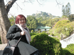 Miaomiao at the path to the Piano Museum at Gulangyu Island, with a view on Sunshine Rock