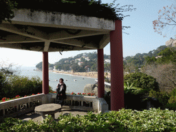 Miaomiao at the Bushan Pavilion at Gulangyu Island, with a view on Gangzaihou Beach and Sunshine Rock