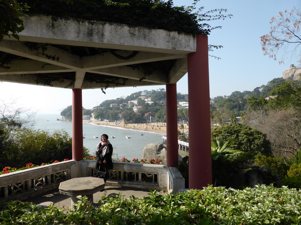 Miaomiao at the Bushan Pavilion at Gulangyu Island, with a view on Gangzaihou Beach and Sunshine Rock