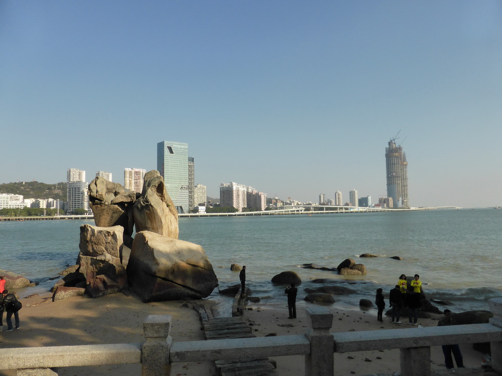 Rocks at the beach at Zhangzhou Road at Gulangyu Island, with a view on the southwest side of Xiamen Island