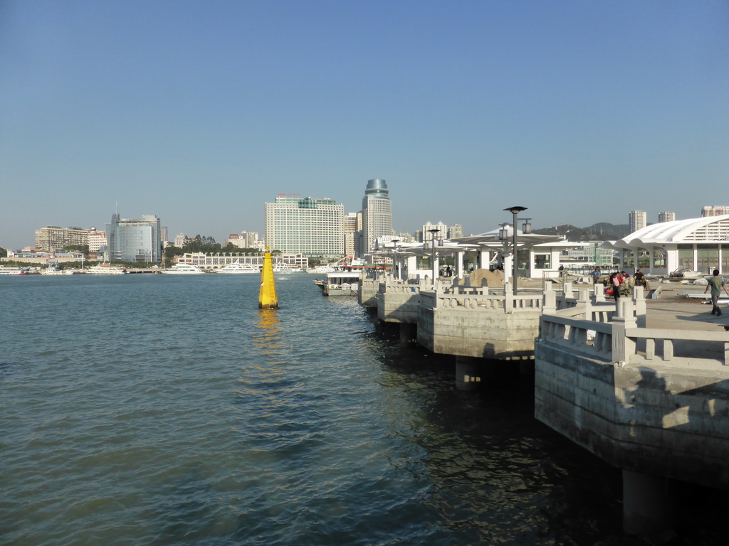 Ferry Quay Terminal at the east side of Gulangyu Island, skyscrapers at the west side of Xiamen Island and Xiamen Bay