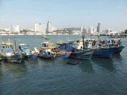 Boats in Xiamen Bay and skyscrapers at the west side of Xiamen Island, viewed from Yanping Road at Gulangyu Island