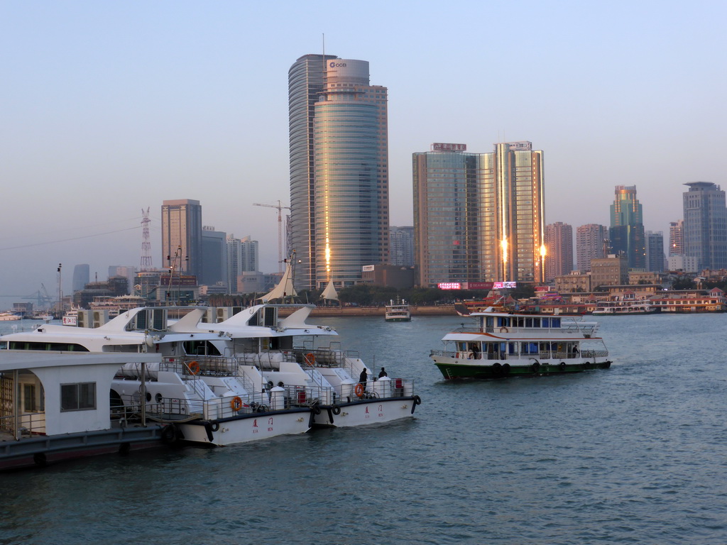 Boats in Xiamen Bay and skyscrapers at the west side of Xiamen Island, viewed from the ferry from Gulangyu Island