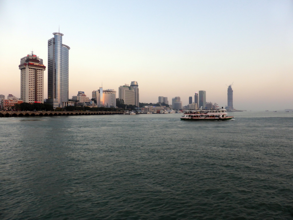 Boats in Xiamen Bay and skyscrapers at the southwest side of Xiamen Island, viewed from the ferry from Gulangyu Island