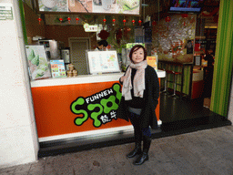 Miaomiao in front of the Funnew Spot bar at the Zhongshan Road Pedestrian Street