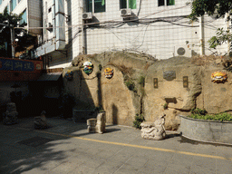 Masks on a wall at the Mintai Characteristic Food Street