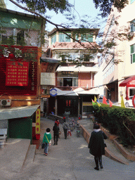 Miaomiao in front of a small temple at Zhenhai Road