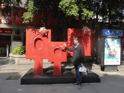 Tim with a piece of art at the Zhongshan Road Pedestrian Street