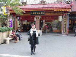 Miaomiao in front of the Ze He Huang Peanut Soup Shop at the Zhongshan Road Pedestrian Street
