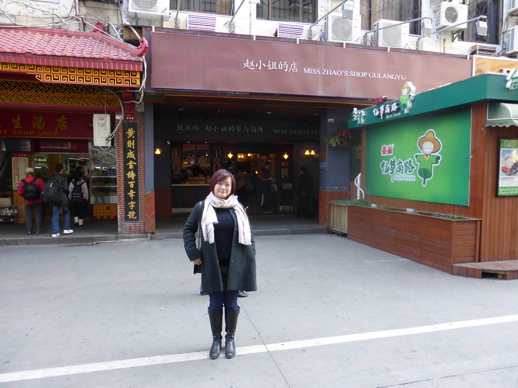 Miaomiao in front of Miss Zhao`s shop at the Zhongshan Road Pedestrian Street