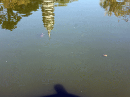 Turtles and the reflected western pagoda in the pool in the park in front of Nanputuo Temple