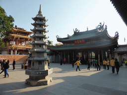 Pagoda, the Bell Pavilion, under renovation, and the back side of the Hall of Heavenly Kings of the Nanputuo Temple