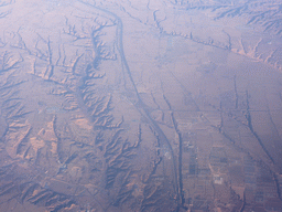 Hills, villages and roads in West Asia, viewed from the airplane to Amsterdam