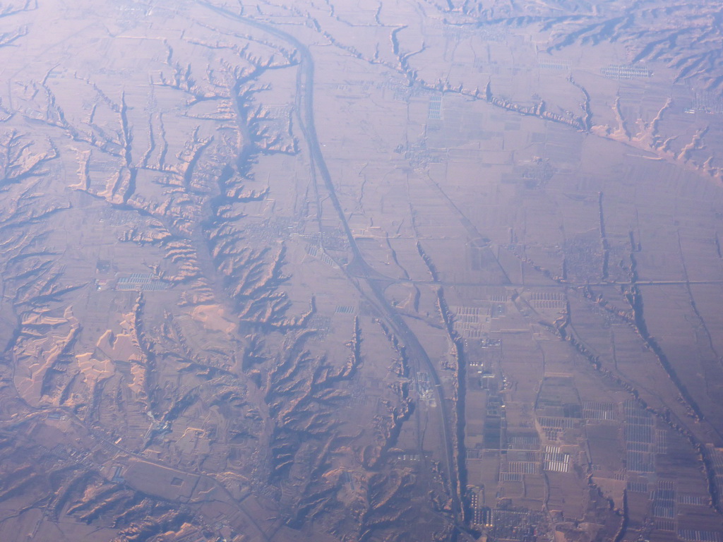 Hills, villages and roads in West Asia, viewed from the airplane to Amsterdam