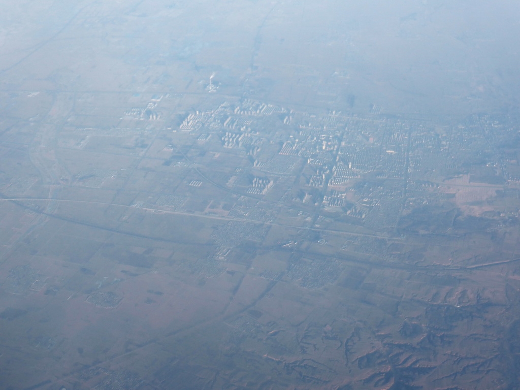 Hills, villages and roads in West Asia, viewed from the airplane to Amsterdam