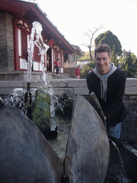 Tim with a fountain at the Huaqing Hot Springs