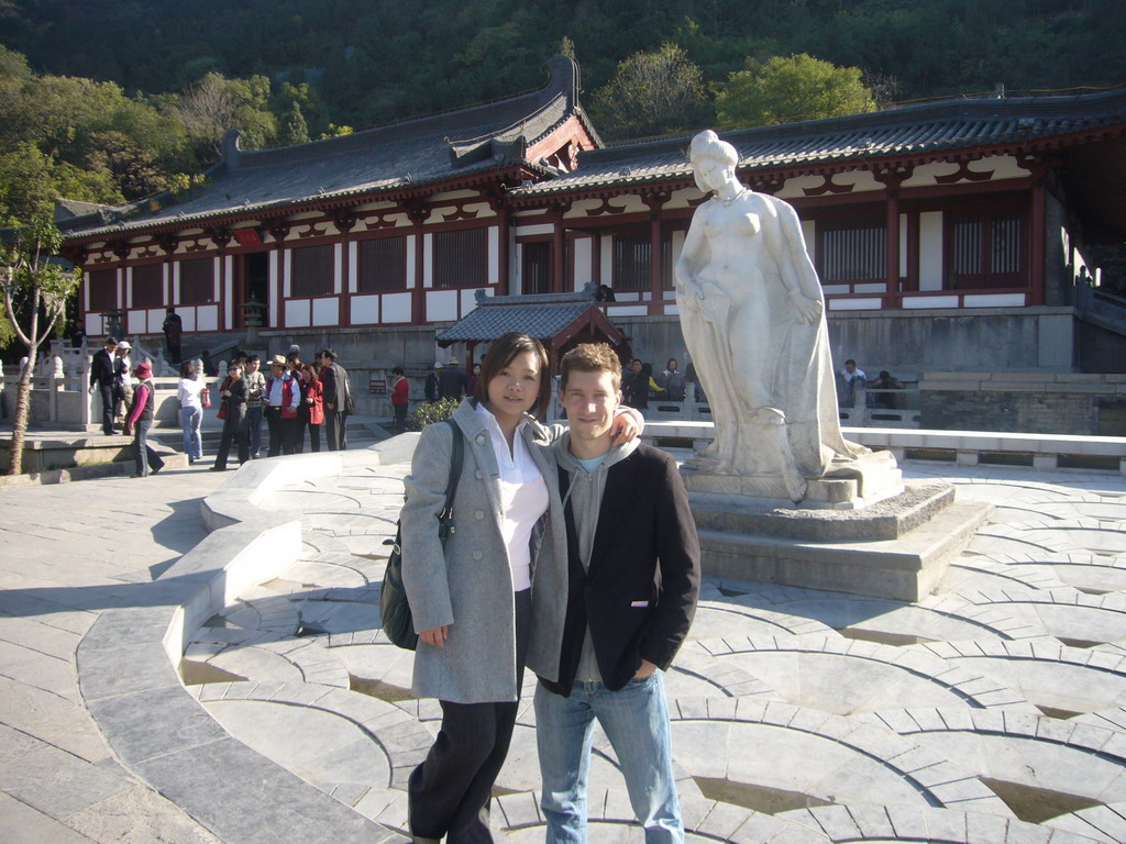 Tim and Miaomiao with a statue of Yang Guifei at the Huaqing Hot Springs