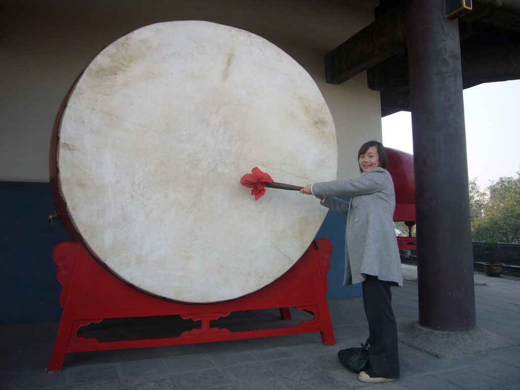 Miaomiao with a drum at the Drum Tower of Xi`an